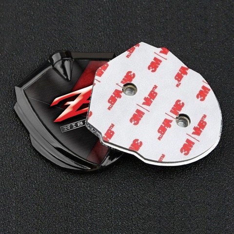 Nissan Emblem Abzeichen Graphit Tonfarbe Schwarz Rote Zerkratzte Oberflache Design