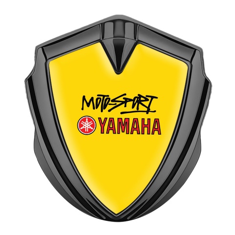 Yamaha Emblem Logo Schriftzug Aufkleber Graphit Tonfarbe Gelb Hintergrund mit Racing Logo Motiv