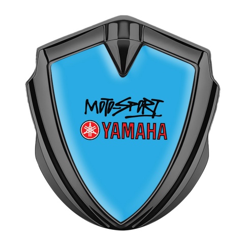 Yamaha Emblem Abzeichen Graphit Tonfarbe Blau Hintergrund mit Motorsport Logo Motiv