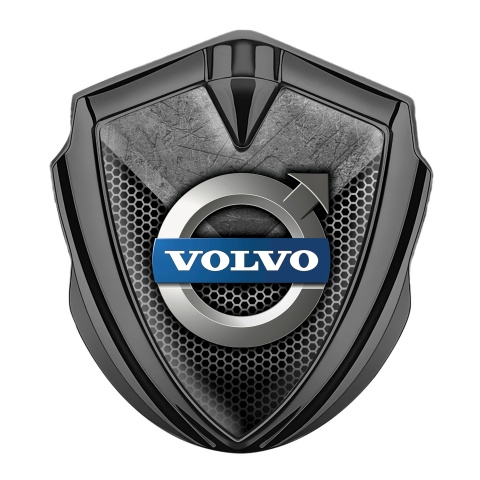 Volvo Emblem Logo Schriftzug Aufkleber Graphit Tonfarbe Zerkratzter Stein mit gitter Design