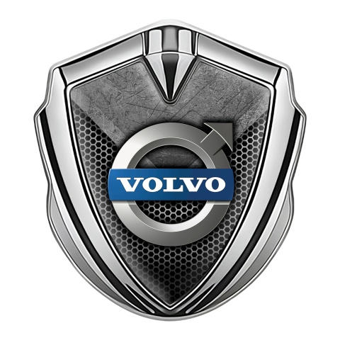 Volvo Emblem Logo Schriftzug Aufkleber Silbertonfarbe Zerkratzter Stein mit gitter Design