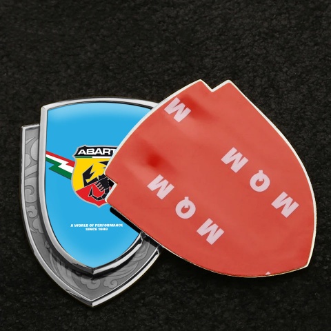 Fiat Abarth Emblem Auto Zeichen Silbertonfarbe Blau Fundament mit Blitz Logo Design
