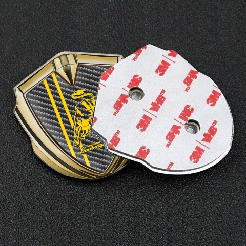 Lamborghini Emblem Abzeichen selbstklebend Goldtonfarbe mit Carbon Hintergrund und Gelb Logo