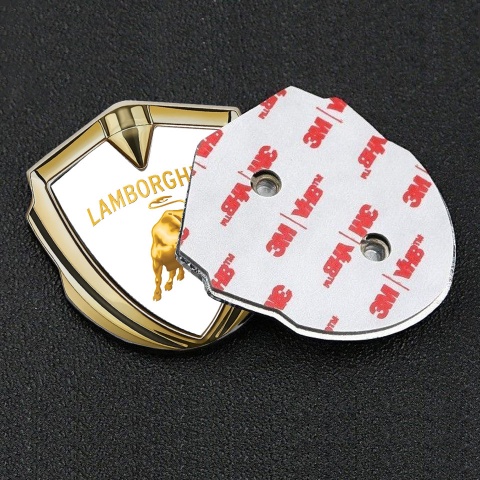 Lamborghini Emblem Abzeichen selbstklebend Goldtonfarbe Weiss Hintergrund und Gold Design Logo