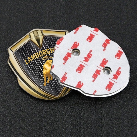 Lamborghini Emblem Logo Schriftzug Aufkleber Goldtonfarbe Perforierter Stahl Hintergrund und Gold Logo design