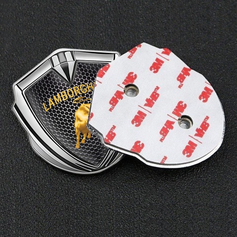 Lamborghini Emblem Logo Schriftzug Aufkleber Silbertonfarbe Perforierter Stahl Hintergrund und Gold Logo design