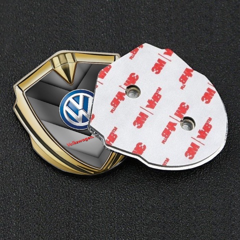 VW Abzeichen selbstklebend Goldtonfarbe mit Graue Pfeile Design Basis und Klassisch Logo 2