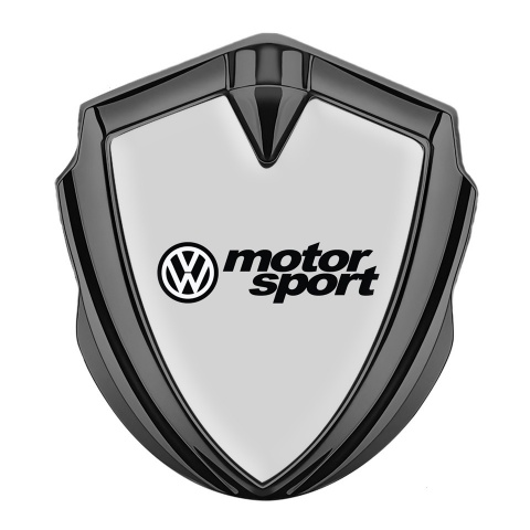 VW Emblem Abzeichen selbstklebend Graphit Tonfarbe mit Grau Basis und Motor Sport Logo