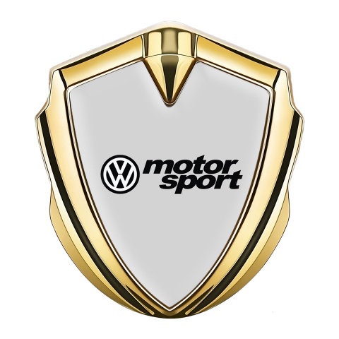 VW Emblem Abzeichen selbstklebend Goldtonfarbe mit Grau Basis und Motor Sport Logo