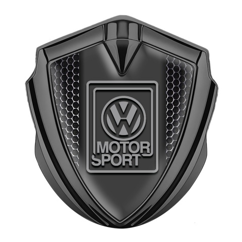 VW Emblem Logo Schriftzug Aufkleber mit Graphit Tonfarbe Perforierter Stahl Hintergrund Design