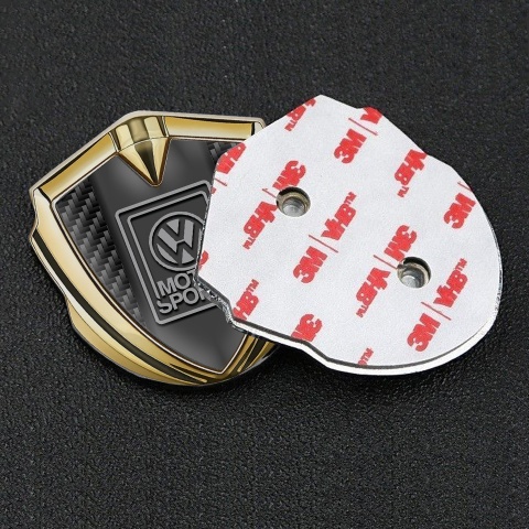 VW Abzeichen selbstklebend Goldtonfarbe mit Schwarz Kohlenstoff Basis und Grau motorsport Logo