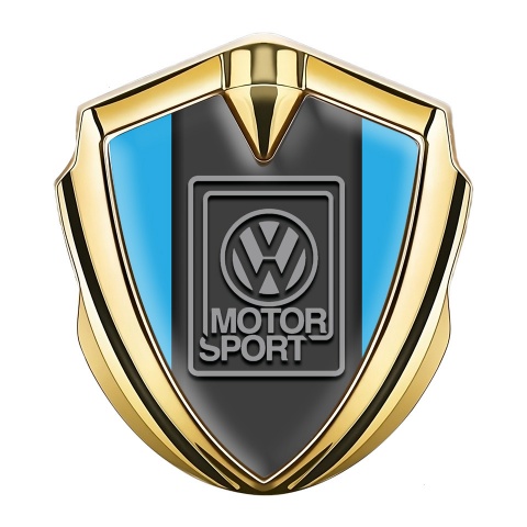 VW Emblem Abzeichen selbstklebend Goldtonfarbe mit Himmelblau Basis und Grau Logo Motorsport