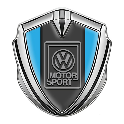 VW Emblem Abzeichen selbstklebend Silbertonfarbe mit Himmelblau Basis und Grau Logo Motorsport