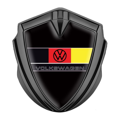 VW Emblem Auto Zeichen  Graphit Tonfarbe mit Schwarz Basis und Logo der Deutschen Flagge