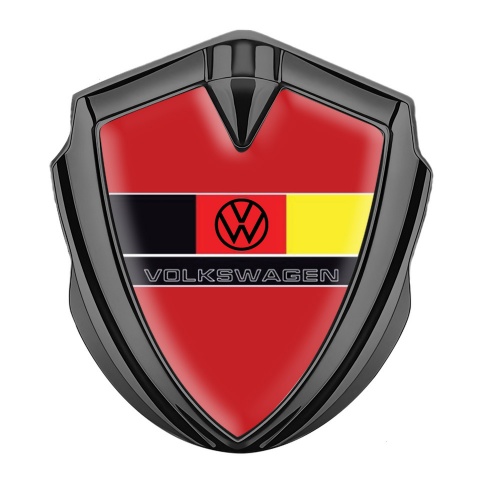 VW Emblem Abzeichen Graphit Tonfarbe mit Rote Basis und Logo der Deutschen Flagge