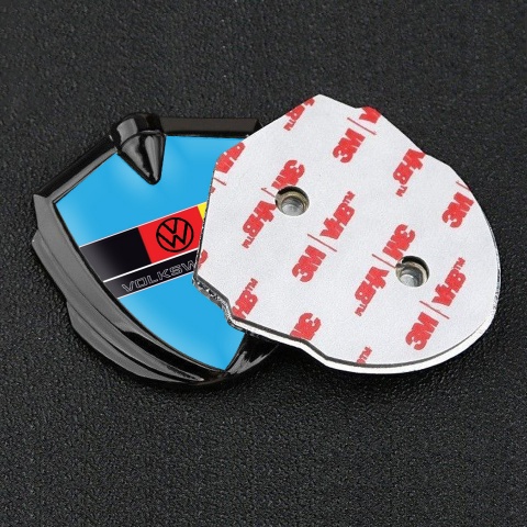 VW Emblem Abzeichen Graphit Tonfarbe mit Himmelblau Vorlage und Deutschen Flagge Logo
