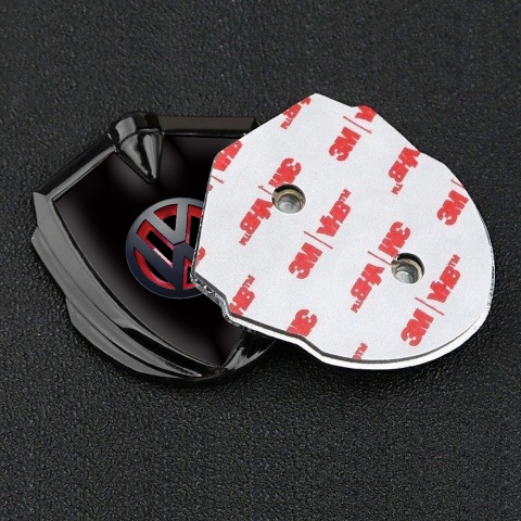 VW Abzeichen selbstklebend Graphit Tonfarbe Schwarz Hintergrund und 3D Logo Design