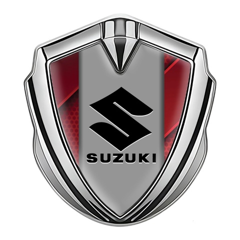 Suzuki Emblem Logo Schriftzug Aufkleber Silbertonfarbe Rote Detsils Fundament und Grau Logo Panel