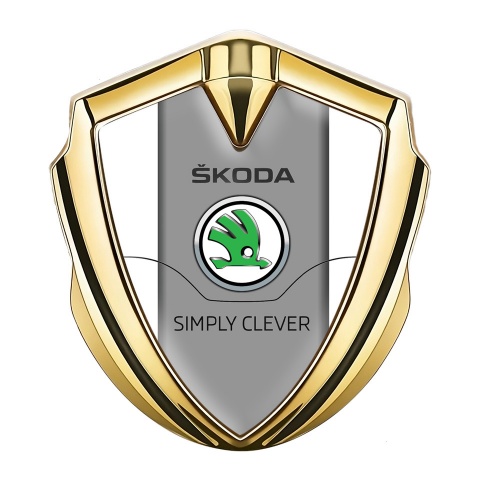 Skoda Emblem Abzeichen Goldtonfarbe mit Weiss Basis und Grau Logo Panel
