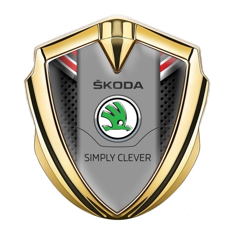 Skoda Selbstklebendes Metallaufkleber Emblem Goldtonfarbe Dunkles Gitter mit Rote Hintergrund elements