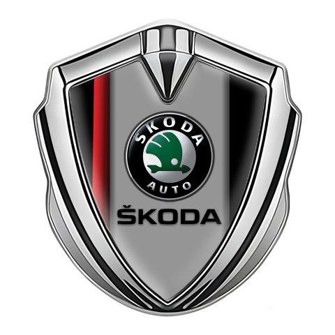 Skoda Emblem Auto Zeichen Silbertonfarbe mit Rote Linie auf schwarzem Sockel Design