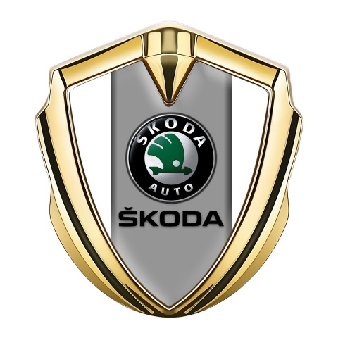 Skoda Seitenflugel Emblem Aufkleber Goldtonfarbe mit Weiss Hintergrund und Grau Logo Panel