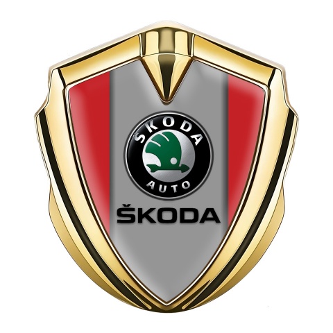 Skoda Emblem Abzeichen Goldtonfarbe mit Rote Basis und Grau Logo Panel