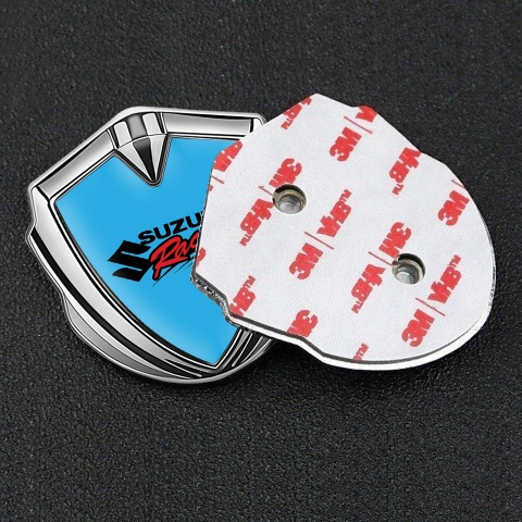 Suzuki Abzeichen selbstklebend Silbertonfarbe Blau fundament mit Racing Logo
