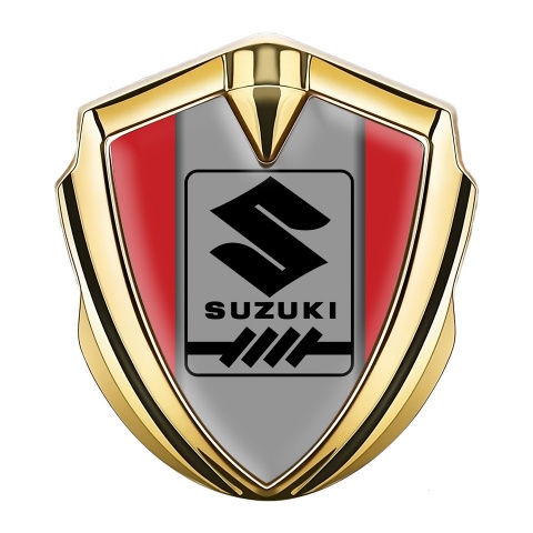 Suzuki Emblem Abzeichen Goldtonfarbe Rote Basis mit Grau Logo Panel