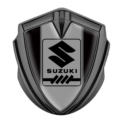 Suzuki Emblem Abzeichen selbstklebend Graphit Tonfarbe Schwarz Basis mit Grau Logo Panel