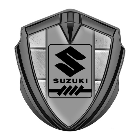 Suzuki Emblem Logo Schriftzug Aufkleber Graphit Tonfarbe Steinblocke Basis mit Grau logo Panel