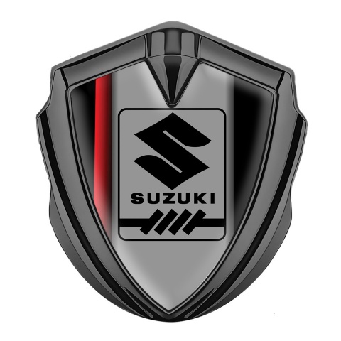Suzuki Emblem Abzeichen selbstklebend Graphit Tonfarbe Schwarz Basis mit Rote Band Stil