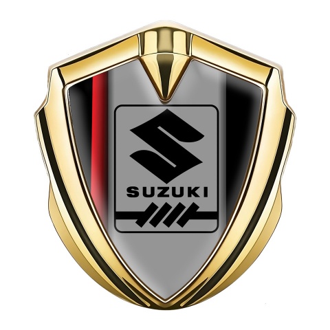 Suzuki Emblem Abzeichen selbstklebend Goldtonfarbe Schwarz Basis mit Rote Band Stil