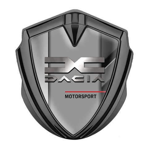 Dacia Emblem Abzeichen selbstklebend Graphit Tonfarbe Polierte Fragmente Hintergrund mit Metall Logo Stil