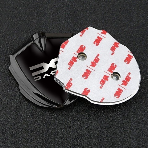 Dacia Abzeichen selbstklebend Graphit Tonfarbe Schwarz basis mit Metall Logo stil