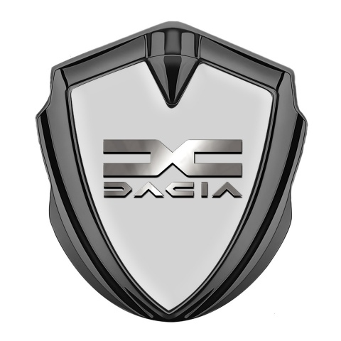 Dacia Selbstklebendes Metallaufkleber Emblem Graphit Tonfarbe Grau Hintergrund mit Metall Logo Design