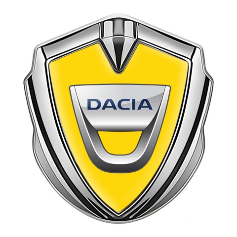 Dacia Abzeichen selbstklebend Silbertonfarbe Gelb hintergrund mit Klassisch Logo