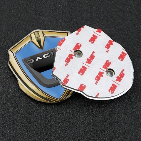 Dacia Emblem Abzeichen selbstklebend Goldtonfarbe Blau Basis mit Graphit Logo