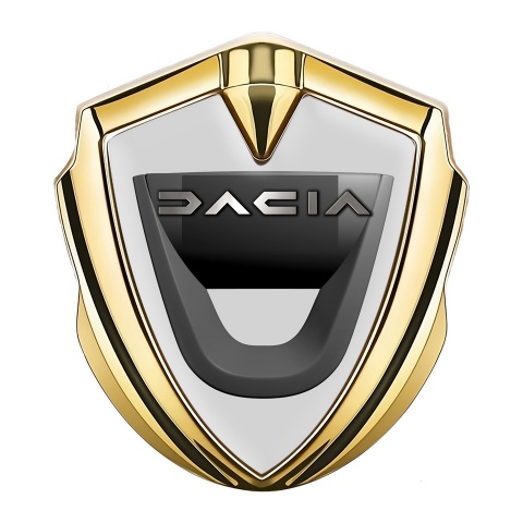 Dacia Emblem Auto Zeichen Goldtonfarbe Grau Hintergrund mit Graphit Logo