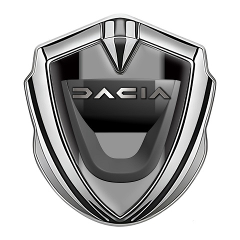 Dacia Abzeichen selbstklebend Silbertonfarbe Schwarz Basis mit Grau Panel Logo