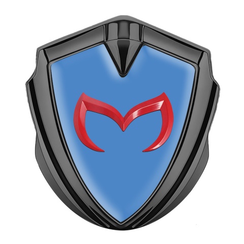 Mazda Emblem Logo Schriftzug Aufkleber Graphit Tonfarbe mit Blau Hintergrund und Rote Logo