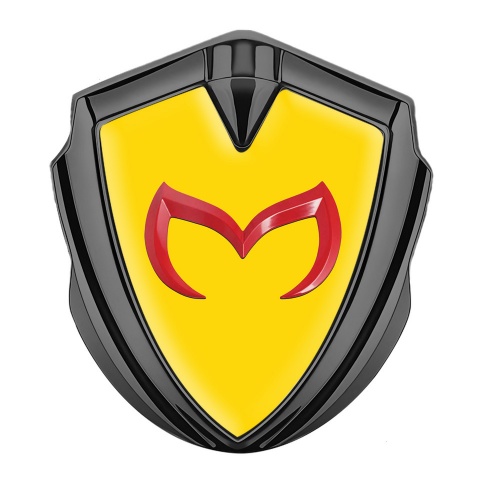 Mazda Abzeichen selbstklebend Graphit Tonfarbe mit Gelb Fundament und Rote logo