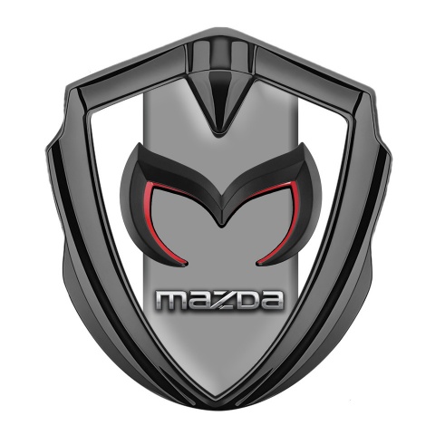 Mazda Emblem Abzeichen Graphit Tonfarbe mit Weiss Hintergrund und Graues Mittelteil
