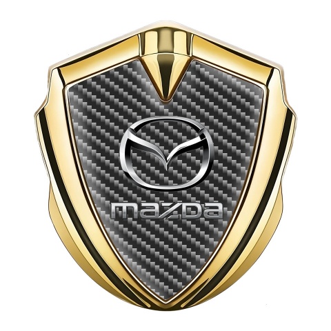 Mazda Emblem Logo Schriftzug Aufkleber Goldtonfarbe Dunkles Carbon Variante