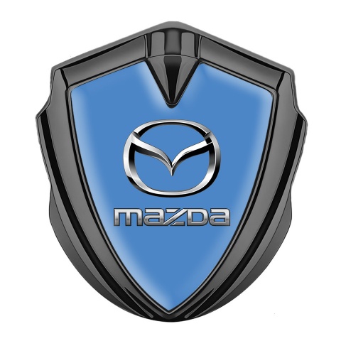Mazda Emblem Abzeichen Graphit Tonfarbe mit Blau Basis und Silber Logo Stil