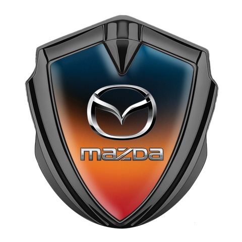 Mazda Emblem Abzeichen Graphit Tonfarbe mit Orange Blau Fundament und Klassisch Logo