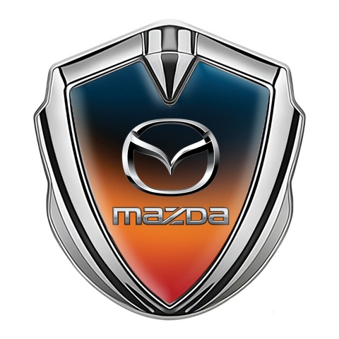 Mazda Emblem Abzeichen Silbertonfarbe mit Orange Blau Fundament und Klassisch Logo