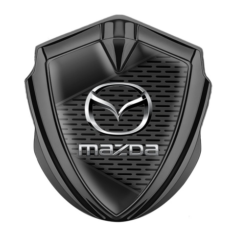 Mazda Seitenflugel Emblem Aufkleber Graphit Tonfarbe mit Mesh Ornament Hintergrund und Silber Logo
