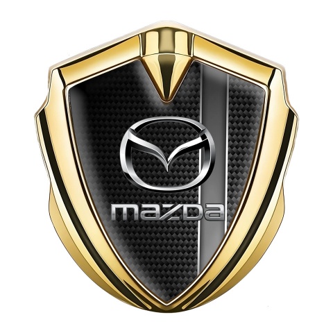 Mazda Abzeichen selbstklebend Goldtonfarbe mit Schwarz Carbon und Grau Sportband Stil