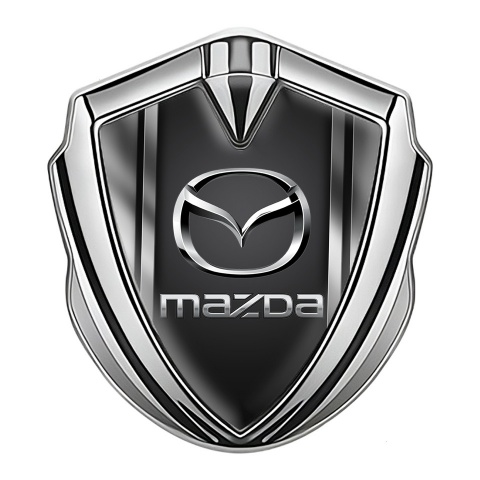 Mazda Emblem Abzeichen selbstklebend Silbertonfarbe mit Metallrahmen Basis und Graphite Logo Panel